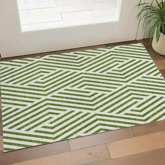 Olive Green And Ivory Geometric Washable Area Rug With UV Protection Photo 1