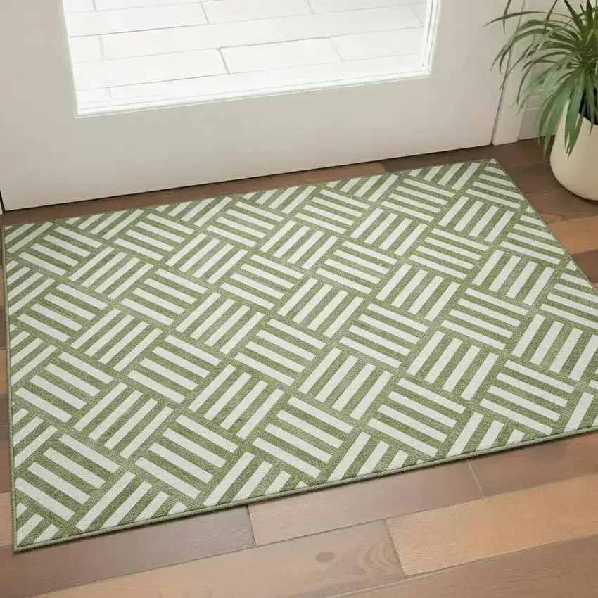 Olive Green And Ivory Geometric Washable Area Rug With UV Protection Photo 1