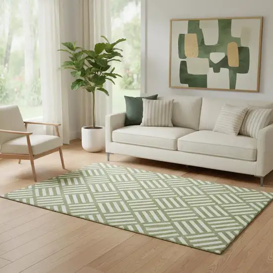 Olive Green And Ivory Geometric Washable Area Rug With UV Protection Photo 1