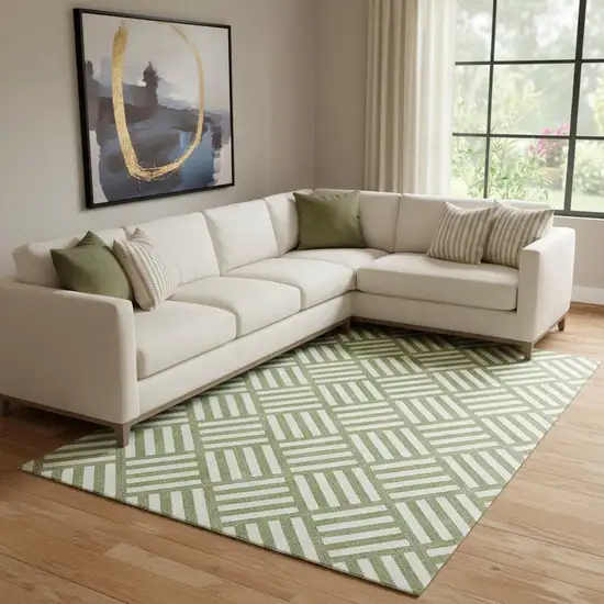 Olive Green And Ivory Geometric Washable Area Rug With UV Protection Photo 1