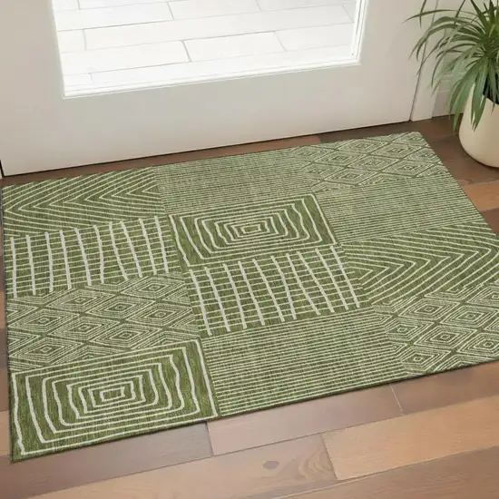 Olive Green And Ivory Geometric Washable Area Rug With UV Protection Photo 1