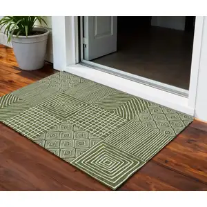 Photo of Olive Green And Ivory Geometric Washable Indoor Outdoor Area Rug