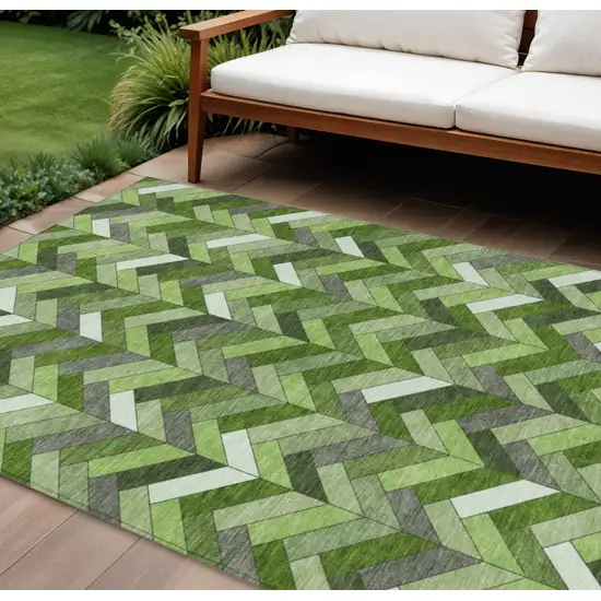 Olive Green And Ivory Geometric Washable Indoor Outdoor Area Rug Photo 1