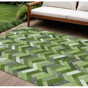 Photo of Olive Green And Ivory Geometric Washable Indoor Outdoor Area Rug