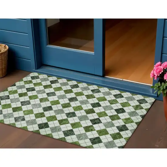 Olive Green And Ivory Geometric Washable Indoor Outdoor Area Rug Photo 1