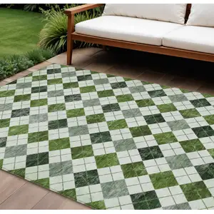 Photo of Olive Green And Ivory Geometric Washable Indoor Outdoor Area Rug