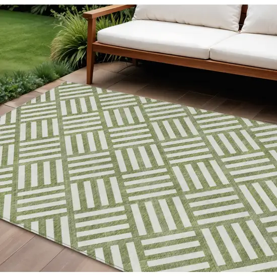 Olive Green And Ivory Geometric Washable Indoor Outdoor Area Rug Photo 1