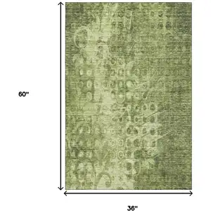 Photo of Olive Green And Ivory Ikat Washable Area Rug With UV Protection