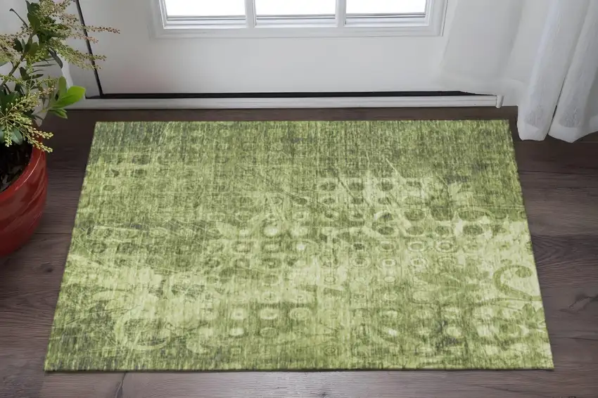 Olive Green And Ivory Ikat Washable Area Rug With UV Protection Photo 2