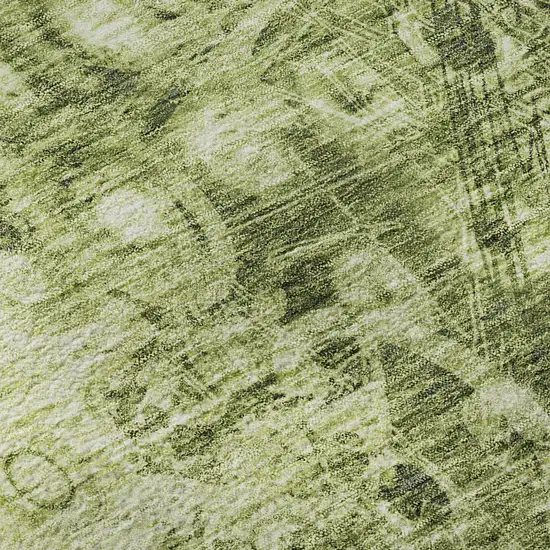 Olive Green And Ivory Ikat Washable Area Rug With UV Protection Photo 9