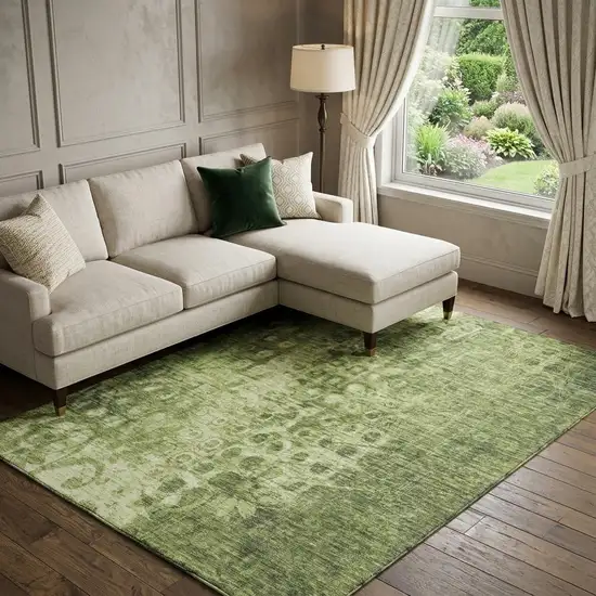 Olive Green And Ivory Ikat Washable Area Rug With UV Protection Photo 1