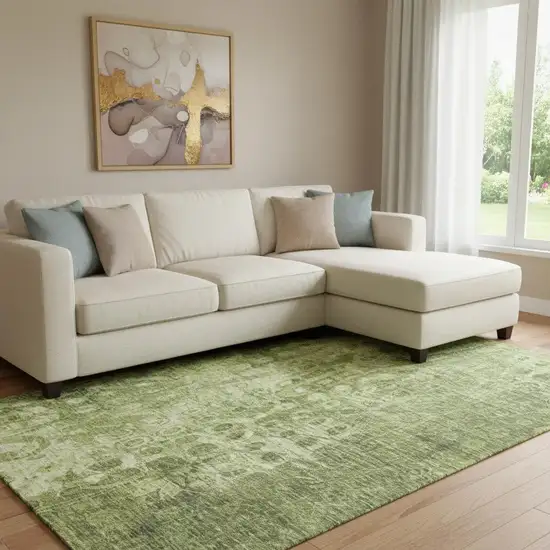 Olive Green And Ivory Ikat Washable Area Rug With UV Protection Photo 1