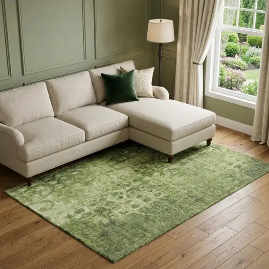 Olive Green And Ivory Ikat Washable Area Rug With UV Protection Photo 1
