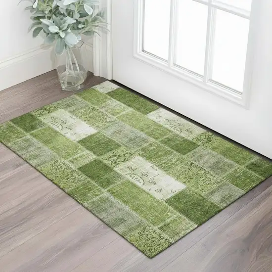 Olive Green And Ivory Patchwork Washable Area Rug With UV Protection Photo 1