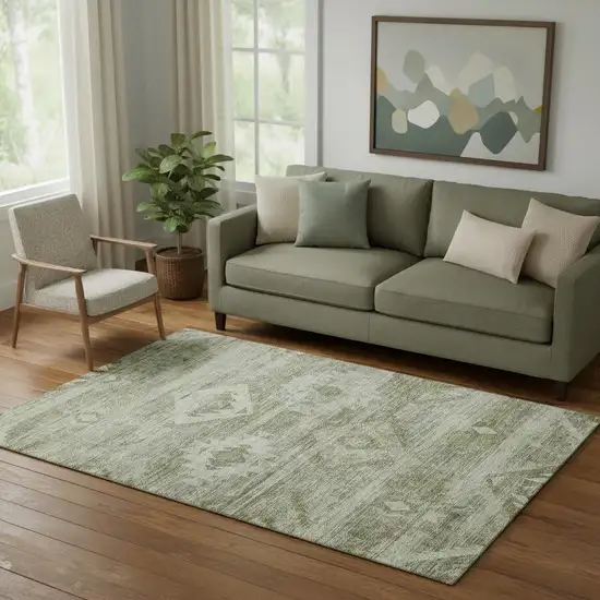 Olive Green And Ivory Southwestern Washable Area Rug With UV Protection Photo 1