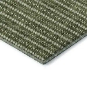 Photo of Olive Green And Ivory Striped Washable Area Rug With UV Protection