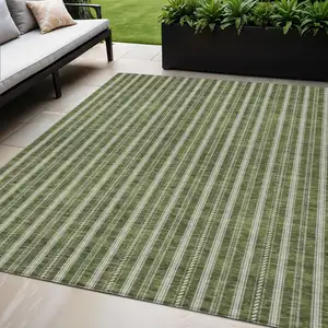 Photo of Olive Green And Ivory Striped Washable Indoor Outdoor Area Rug