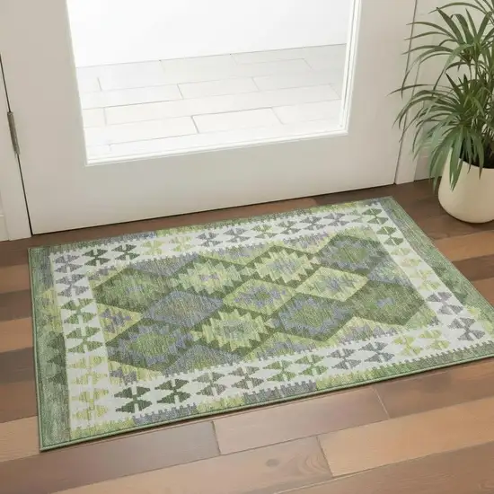 Olive Green And Ivory Tribal Washable Area Rug With UV Protection Photo 2