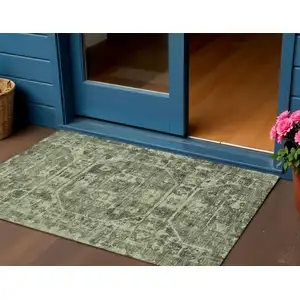 Photo of Olive Green And Ivory Tribal Washable Indoor Outdoor Area Rug