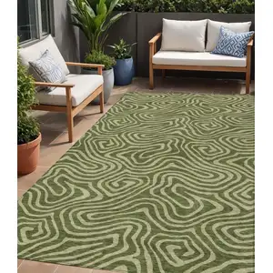 Photo of Olive Green And Light Green Abstract Washable Indoor Outdoor Area Rug