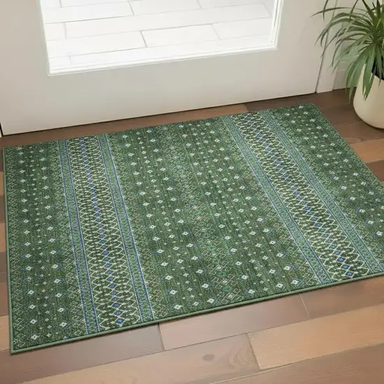 Olive Green Blue And Ivory Tribal Washable Area Rug With UV Protection Photo 1