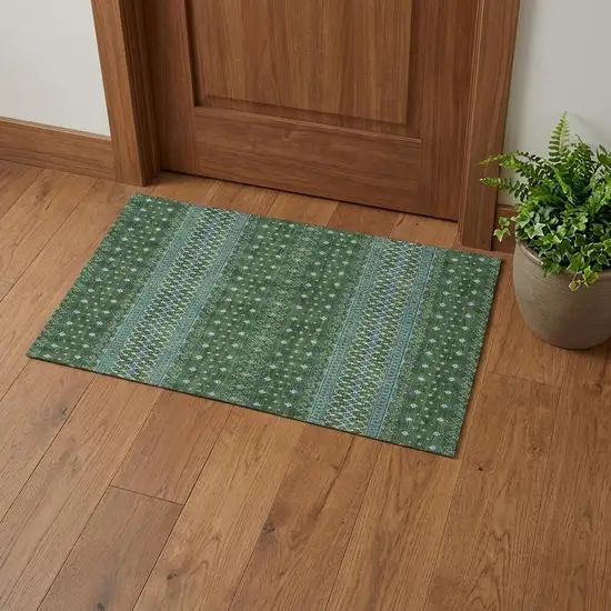Olive Green Blue And Ivory Tribal Washable Area Rug With UV Protection Photo 1