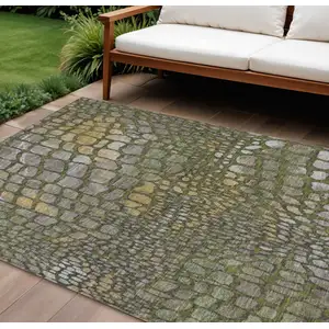Photo of Olive Green Brown And Gold Abstract Washable Indoor Outdoor Area Rug