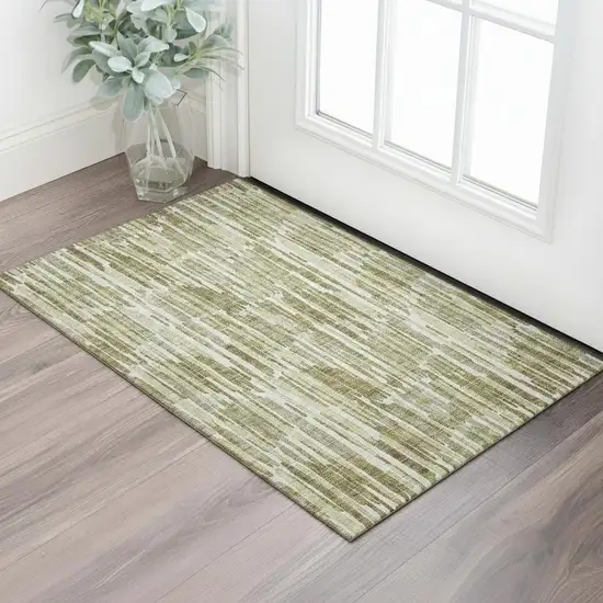 Olive Green Brown And Ivory Abstract Washable Area Rug With UV Protection Photo 1