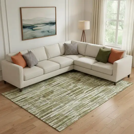 Olive Green Brown And Ivory Abstract Washable Area Rug With UV Protection Photo 1