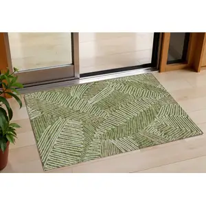 Photo of Olive Green Brown And Ivory Floral Washable Indoor Outdoor Area Rug