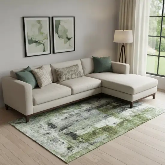 Olive Green Charcoal And Ivory Abstract Washable Area Rug With UV Protection Photo 1