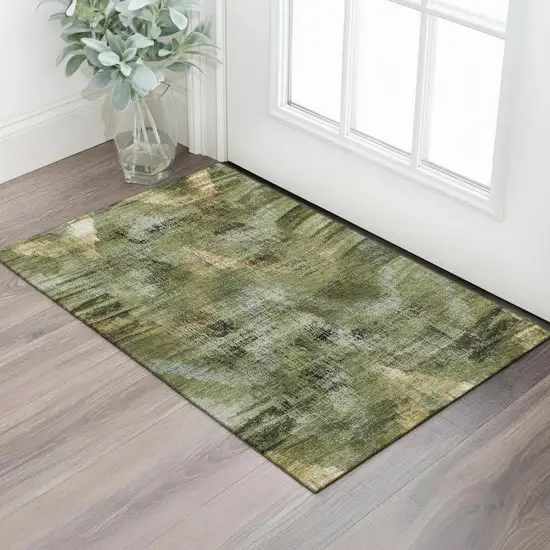 Olive Green Gold And Charcoal Abstract Washable Area Rug With UV Protection Photo 1