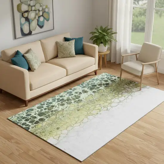Olive Green Gold And Ivory Abstract Washable Area Rug With UV Protection Photo 1