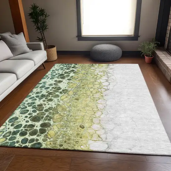 Olive Green Gold And Ivory Abstract Washable Area Rug With UV Protection Photo 4