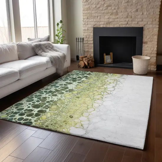 Olive Green Gold And Ivory Abstract Washable Area Rug With UV Protection Photo 5