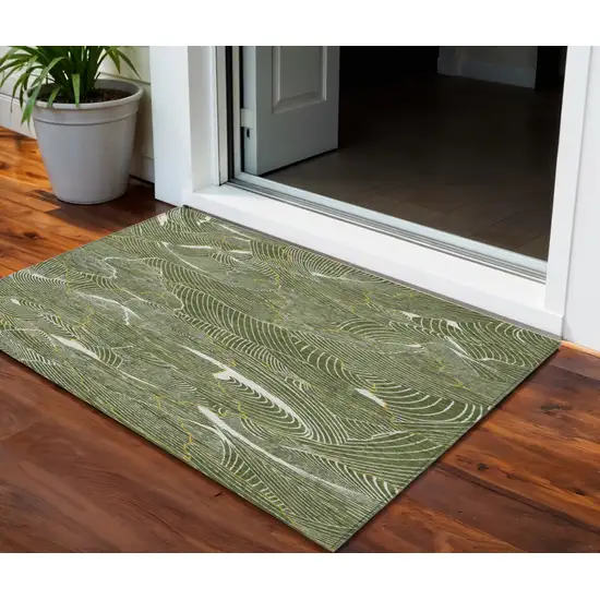 Olive Green Gold And Ivory Abstract Washable Indoor Outdoor Area Rug Photo 1