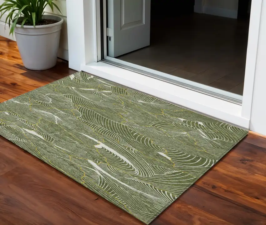 Olive Green Gold And Ivory Abstract Washable Indoor Outdoor Area Rug Photo 1