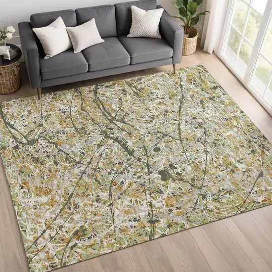Olive Green Gold And Ivory Abstract Washable Indoor Outdoor Area Rug Photo 4