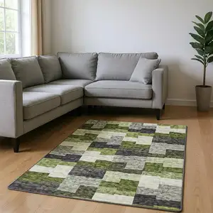 Photo of Olive Green Gray And Ivory Geometric Washable Area Rug With UV Protection