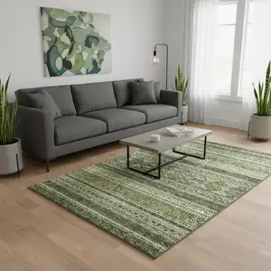 Photo of Olive Green Gray And Ivory Southwestern Washable Area Rug With UV Protection