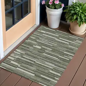 Photo of Olive Green Gray And Ivory Striped Washable Indoor Outdoor Area Rug