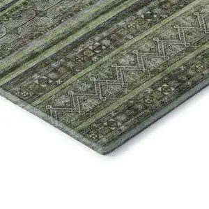 Photo of Olive Green Gray And Silver Striped Washable Area Rug With UV Protection