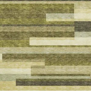 Photo of Olive Green Ivory And Beige Striped Washable Area Rug With UV Protection