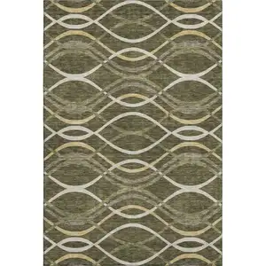 Photo of Olive Green Ivory And Gold Abstract Washable Area Rug With UV Protection