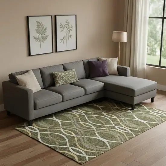 Olive Green Ivory And Gold Abstract Washable Area Rug With UV Protection Photo 1