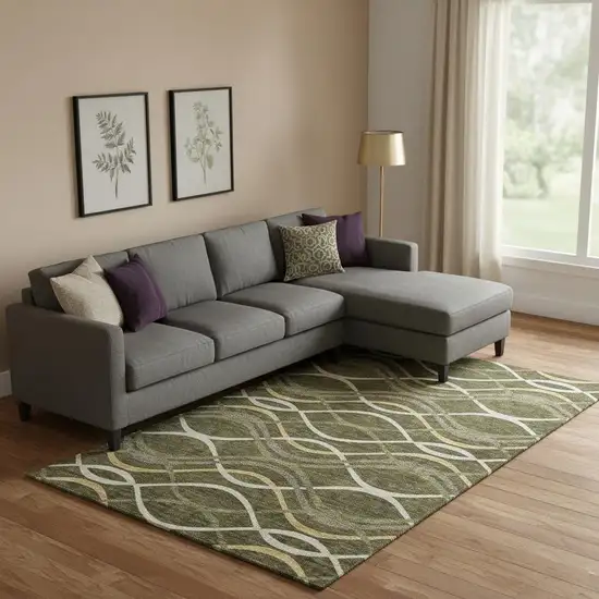 Olive Green Ivory And Gold Abstract Washable Area Rug With UV Protection Photo 1