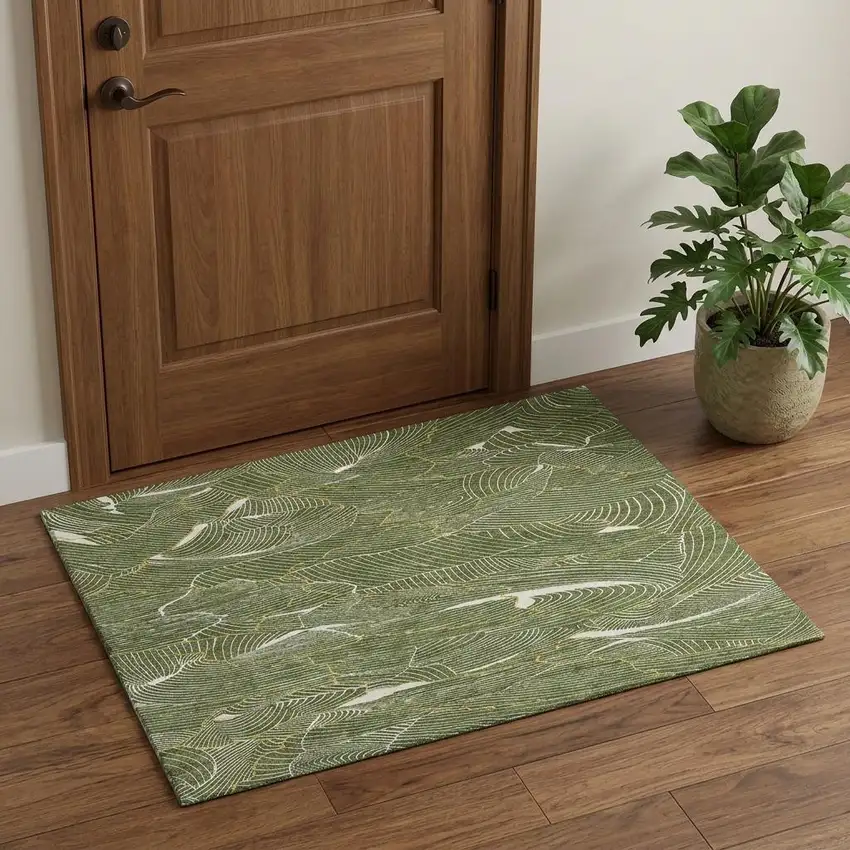 Olive Green Ivory And Gold Abstract Washable Area Rug With UV Protection Photo 1