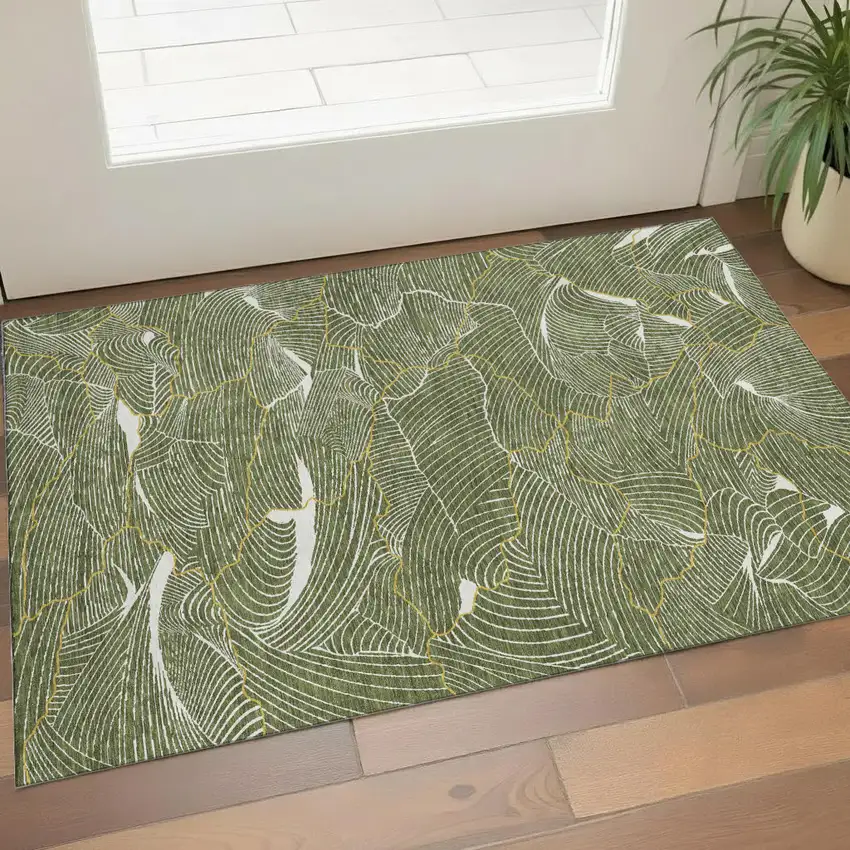 Olive Green Ivory And Gold Abstract Washable Area Rug With UV Protection Photo 1