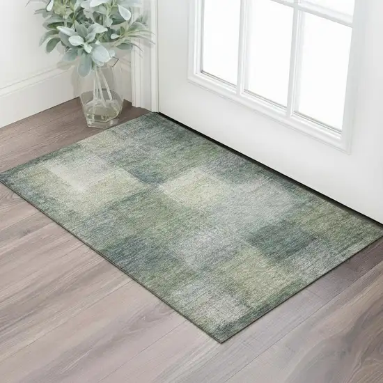 Olive Green Ivory And Gray Abstract Washable Area Rug With UV Protection Photo 1
