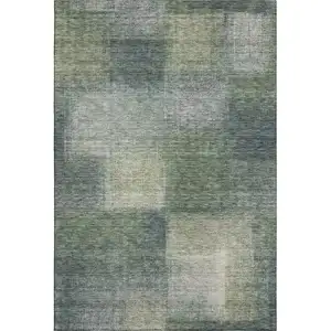 Photo of Olive Green Ivory And Gray Abstract Washable Area Rug With UV Protection